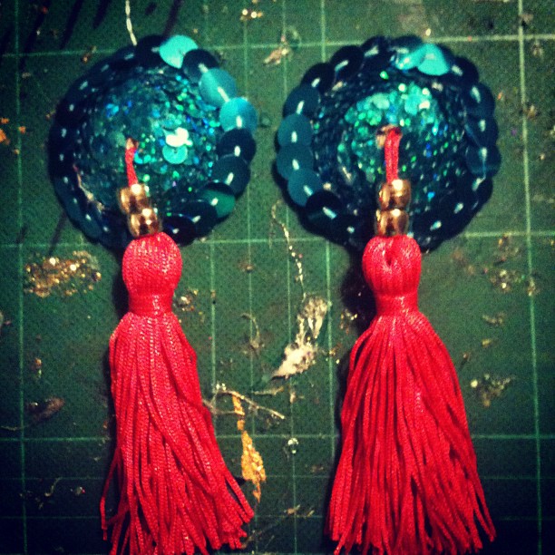 Tourquoise, red and gold tassels by Tuesday Laveau